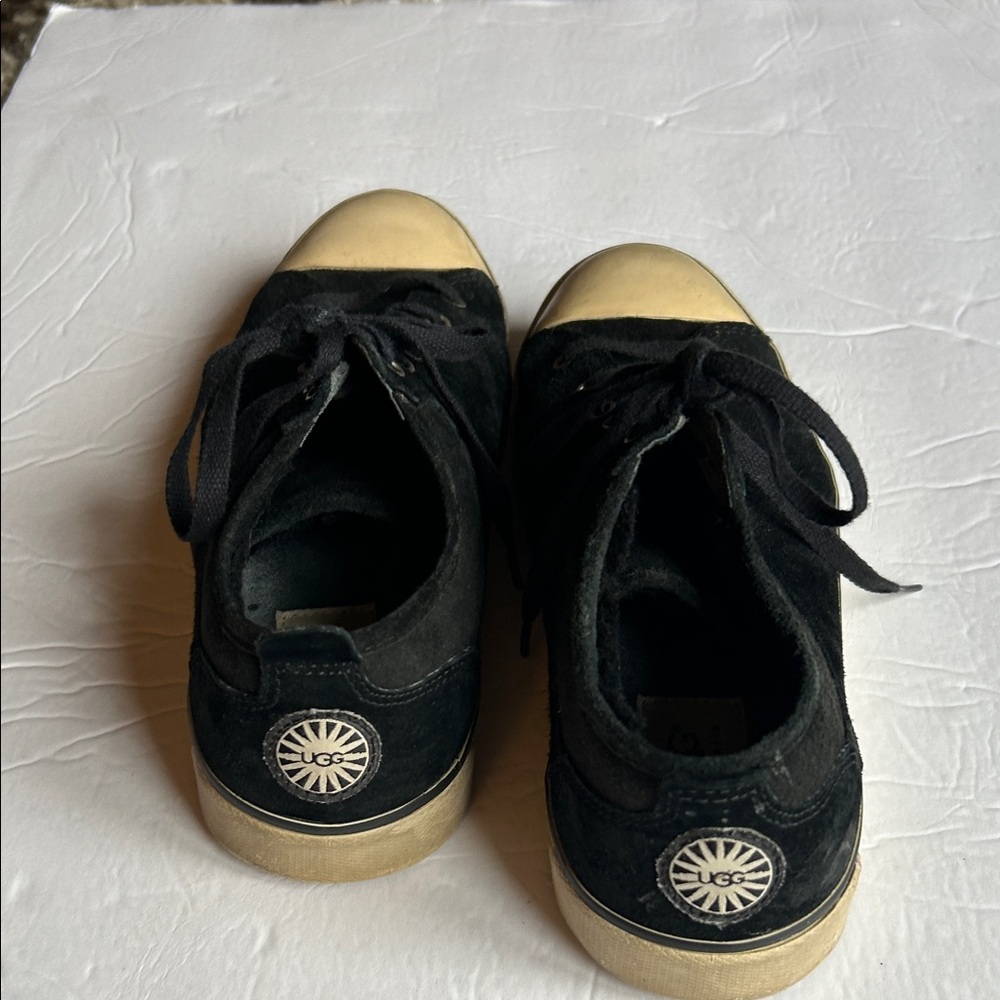 UGG Black and Tan Sneakers with Sherpa lining. Size 8. Very comfortable.
